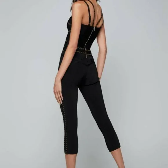 💋 BEBE Black Studded Bandage Bodycon Jumpsuit XS New RARE 💋 - Picture 2 of 6